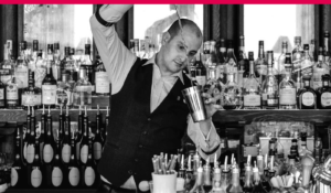 Cocktail Mixologist showing off his bartending skills
