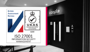 ISO 27001 certification award logo next to the entrance to the Coople UK office